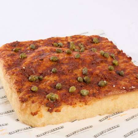 Libby's gluten free mixed peppers and caper foccacia on a white background